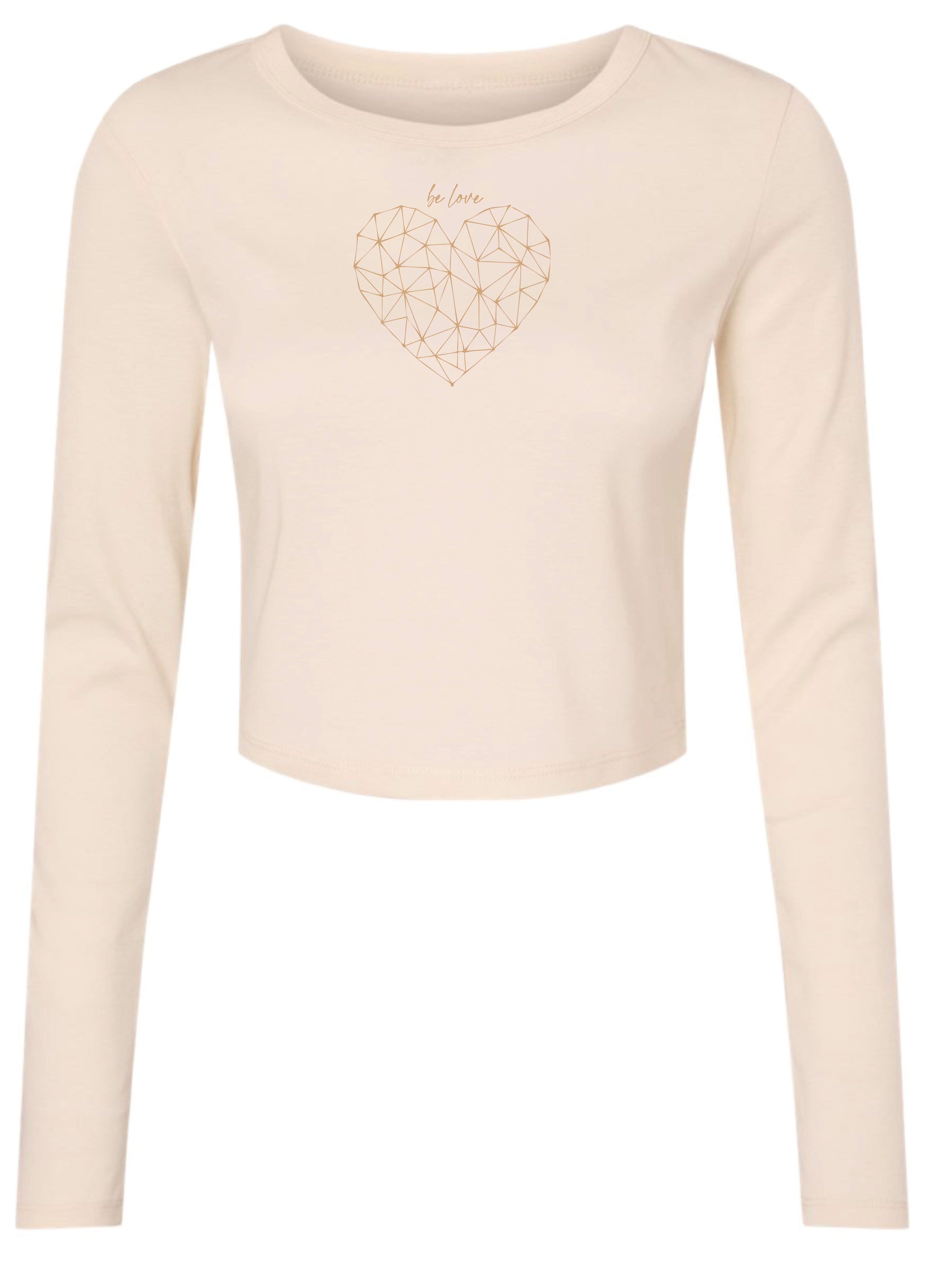 Beige long-sleeve top with a geometric heart design on a white background